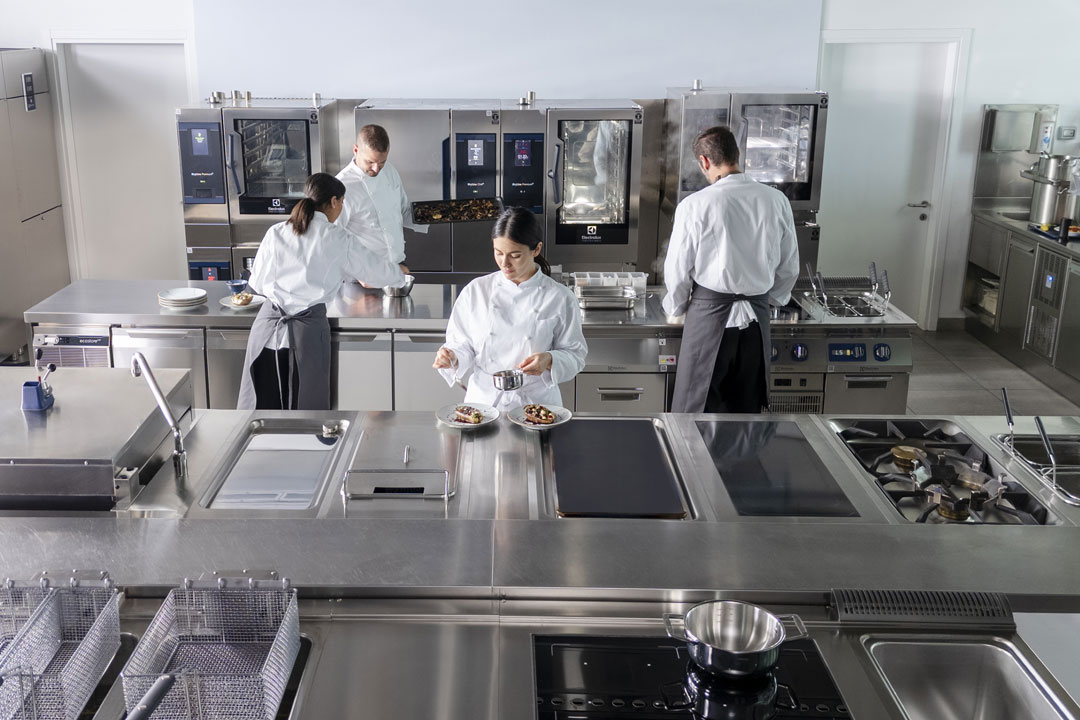 Electrolux Professional chefs cooking in the newest version of the test kitchen