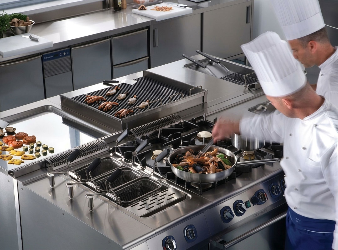 Modular cooking systems allow kitchens to combine gas and induction technologies within a single professional workspace.