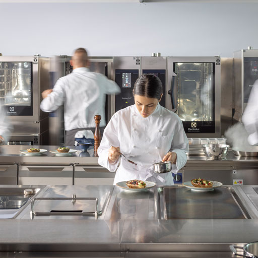 Chefs working in an Electrolux Professional commercial kitchen